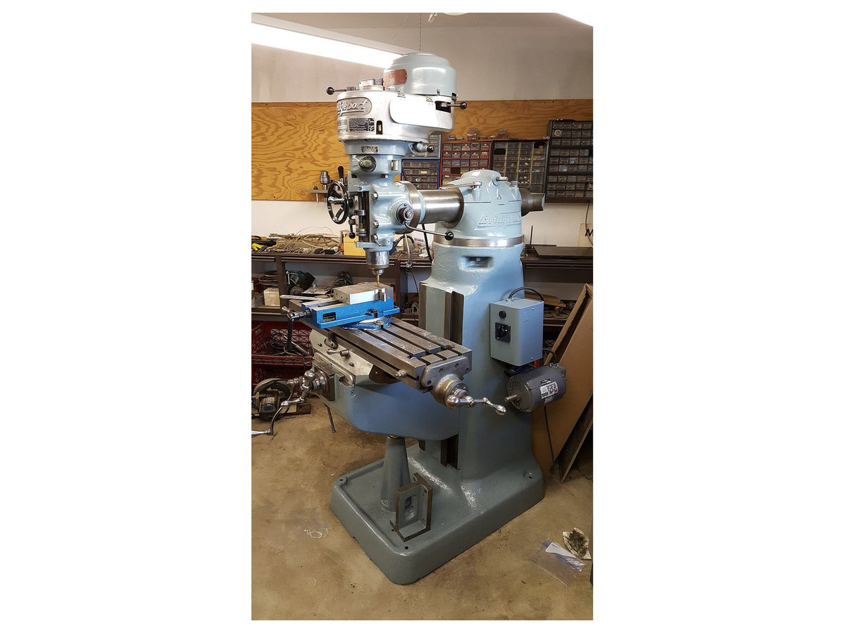 Illustrative Bridgeport-style knee mill (not an AMI installation)